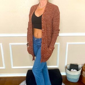 Long sleeve cardigan with pockets. Size medium